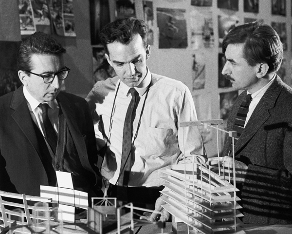 Colin Low (center) and Roman Kroitor (right) discussing Labyrinth Pavilion for Expo 67 Montreal